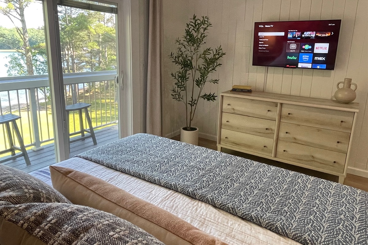 Enjoy lake views and your favorite show - all from the comfort of bed
