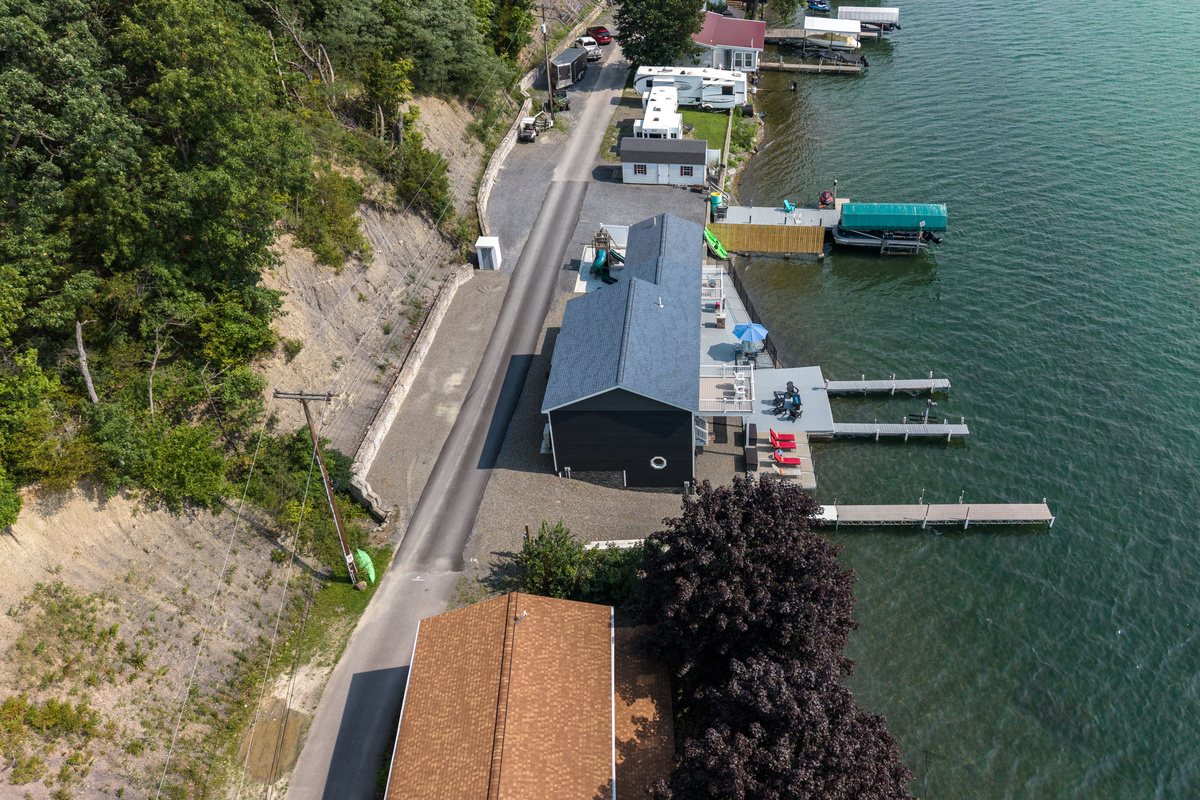 Waterfront property positioned between road and lake