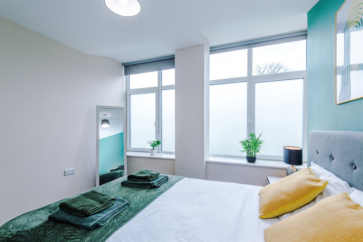 Bedroom 1 benefits from a hotel comfort large double bed, wardrobe with hangers & blackout blinds 