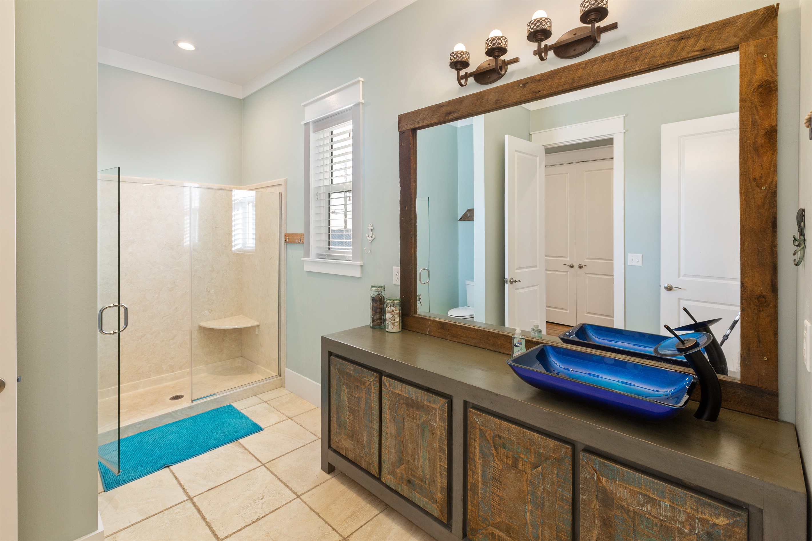 Huge second floor bathroom is attached to the Mermaid room, one of two king bedrooms on the 2nd floor. This bathroom is shared with the common area on this floor but has a separate, locking door for privacy.