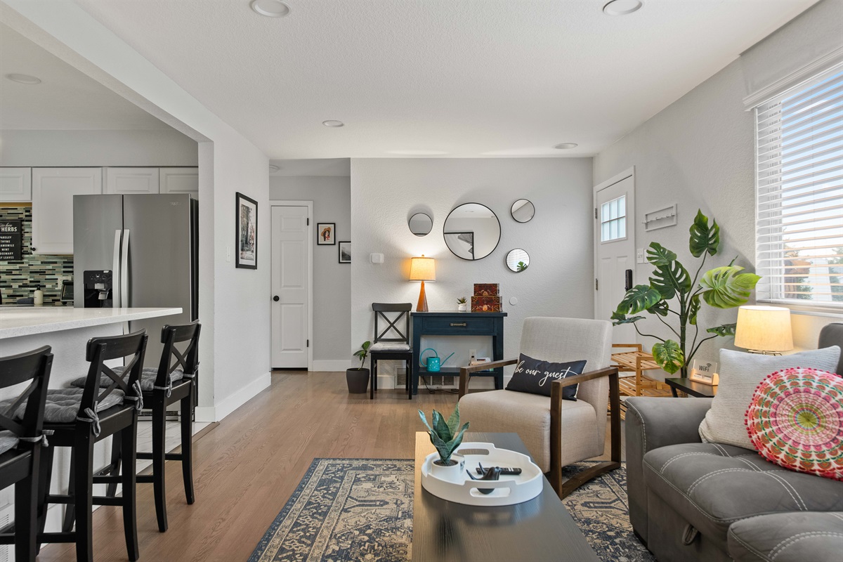 Stylish living area with bar seating and modern decor