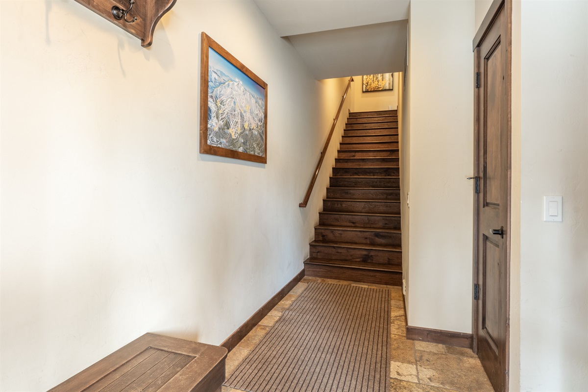 This thoughtfully designed three-level townhome places garage and entry at the ground level, gathering spaces and bunkroom on the main level, and primary bedrooms above for added privacy and separation.
