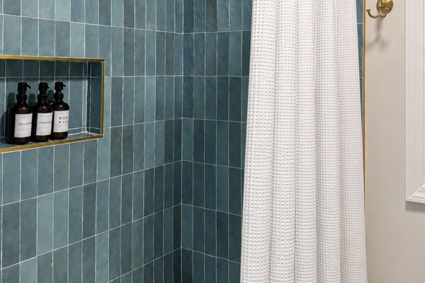 Enjoy showering in the newly renovated hall bathroom. It's gorgeous!
