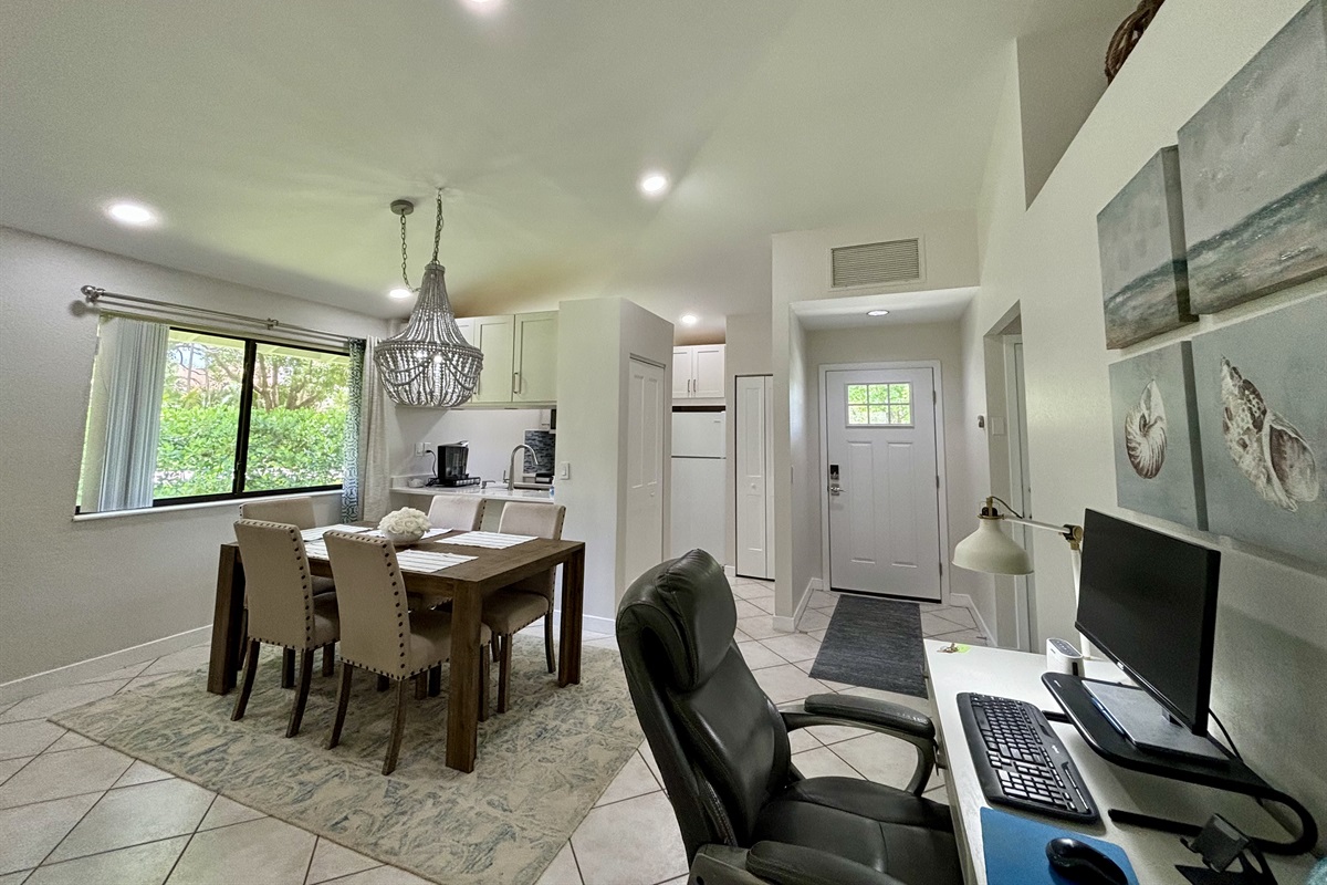 The office work desk is located in the general are between the living room and dining area. A comfortable desk chair and monitor gives you a great place to get work done if needed.