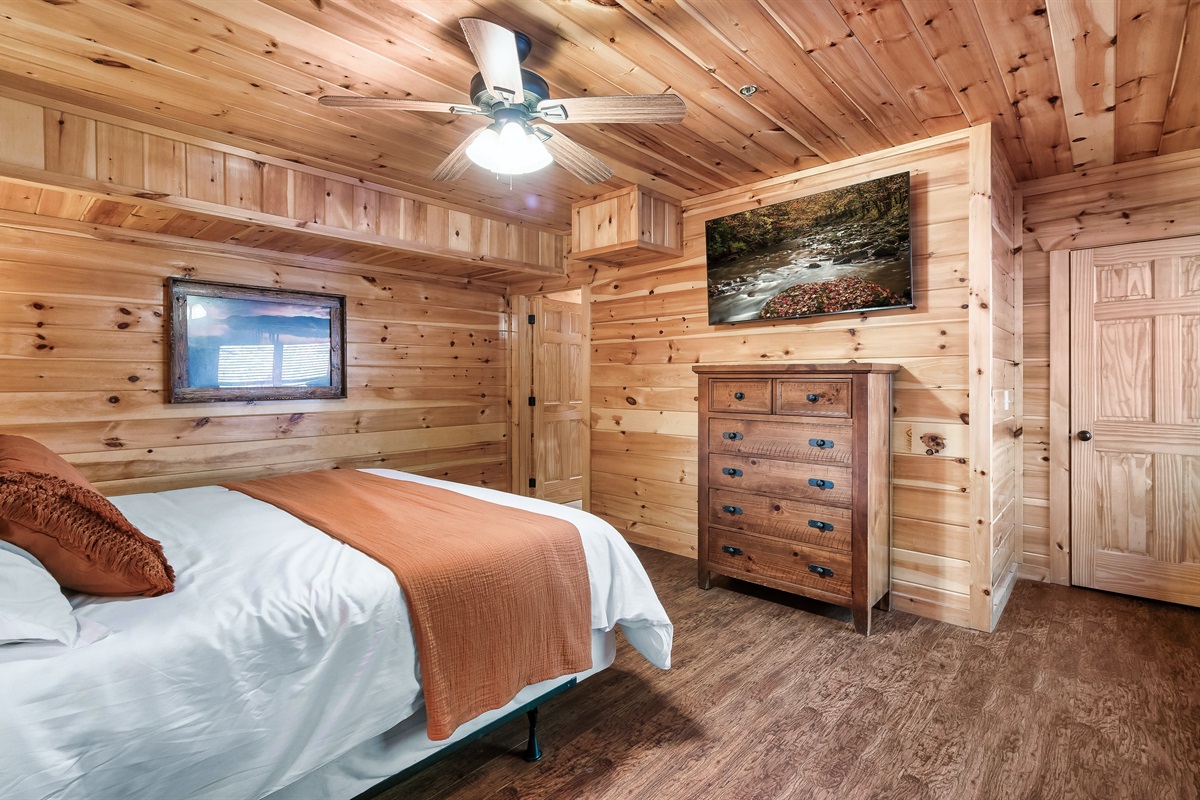 Relax into a warm, inviting bedroom that feels calm, comfortable, and perfect after a full mountain day.