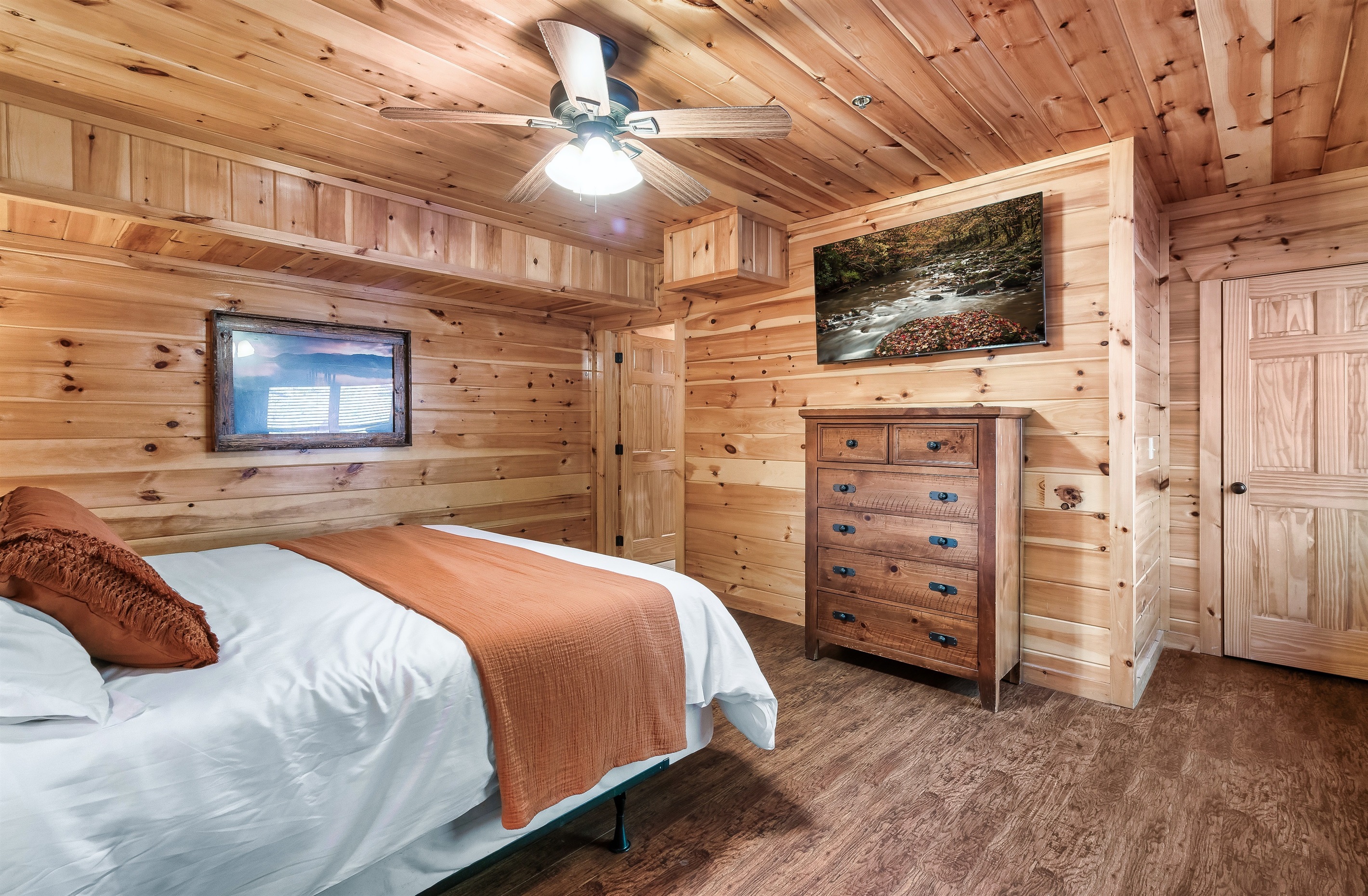 Relax into a warm, inviting bedroom that feels calm, comfortable, and perfect after a full mountain day.