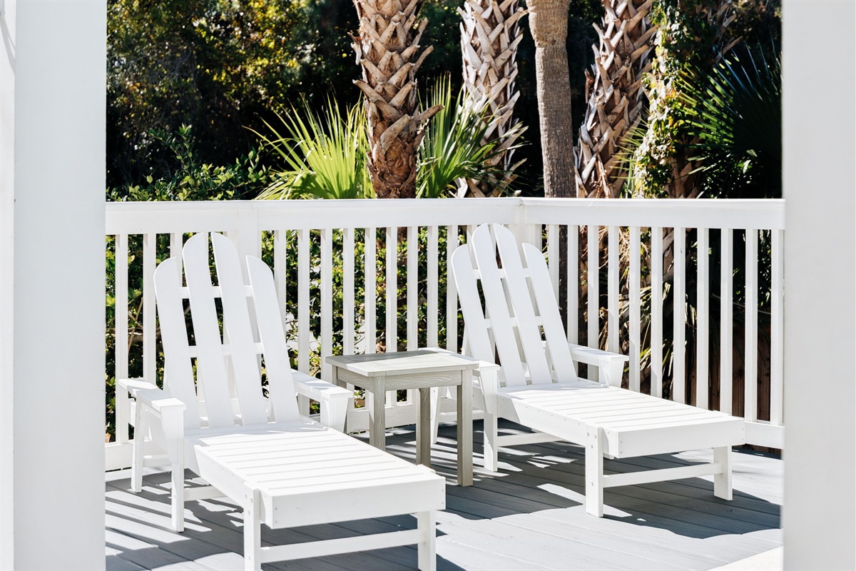 Private outdoor pool area conveniently located just outside the living room and kitchen, featuring a heated pool with a beautiful waterfall, seating and loungers, plus an outdoor grill and kitchenette