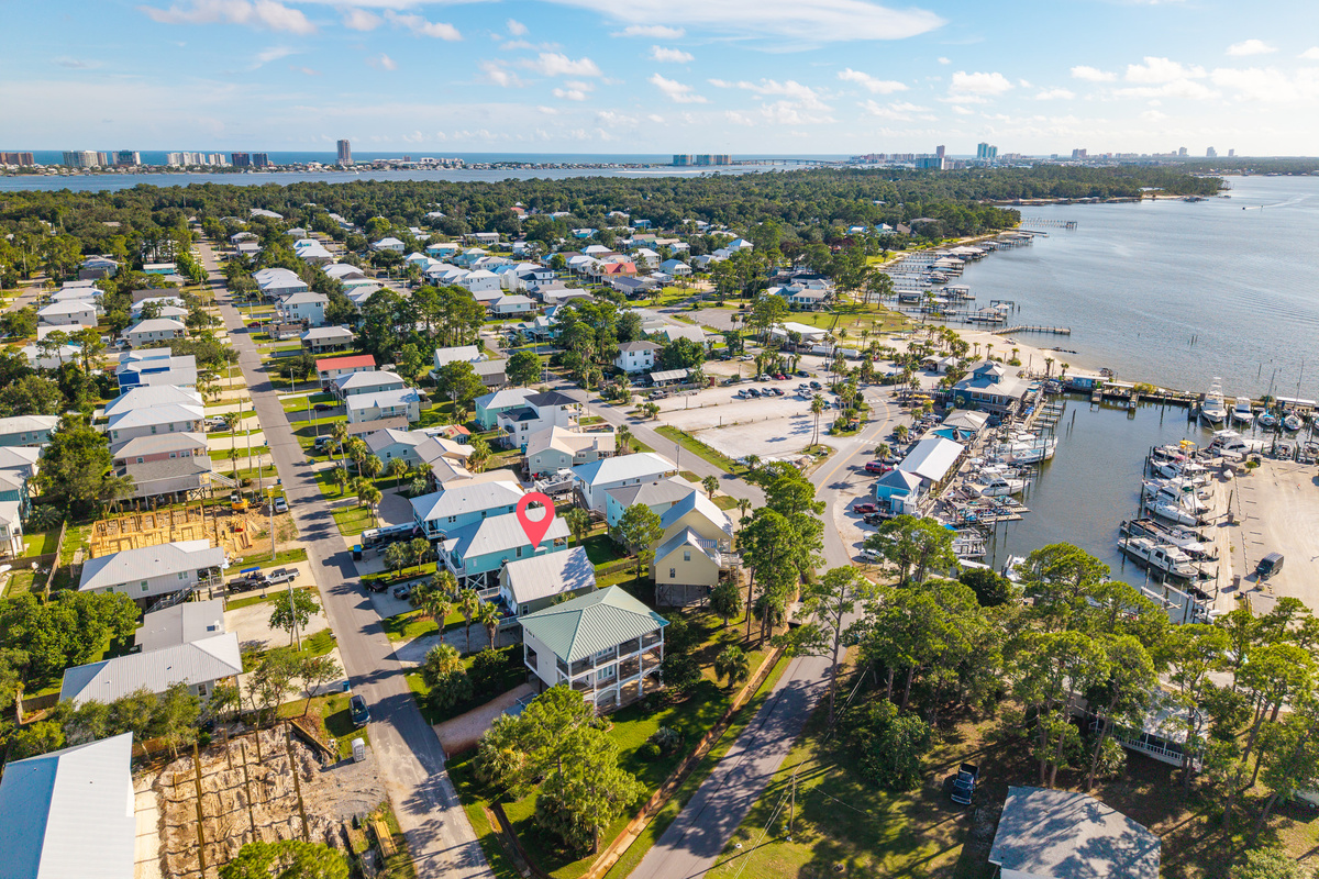 The wider Bear Point community offers scenic waterways and a relaxed, residential feel just minutes from the beach.