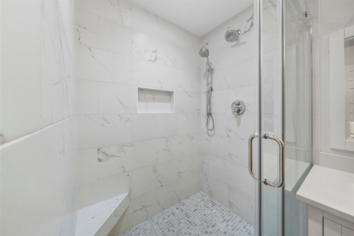 Primary Ensuite Bathroom 1 Walk-In Marble Shower |  IOP Escapes Beach Blessing | 3705 Hartnett Blvd, Isle of Palms, SC