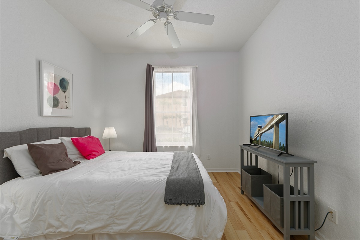 There is a Smart Roku TV in the queen bedroom.