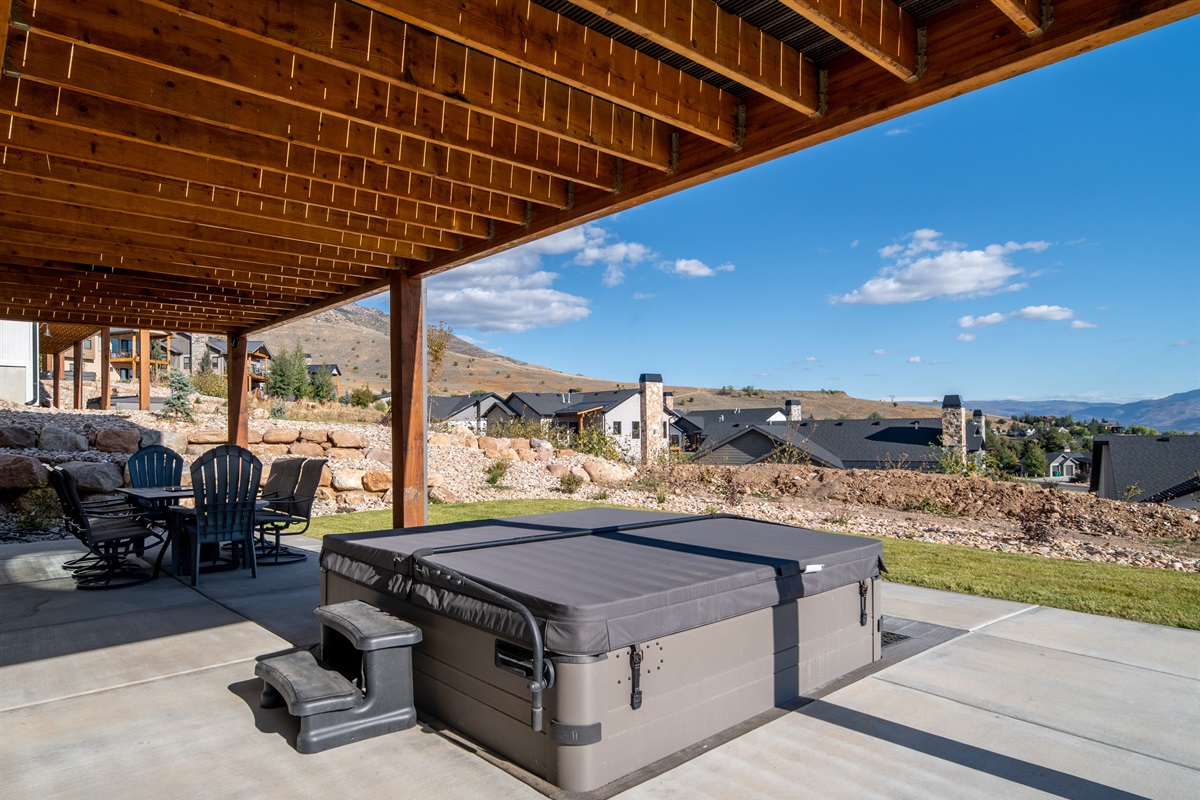 Private hot tub—relax and soak under the stars.