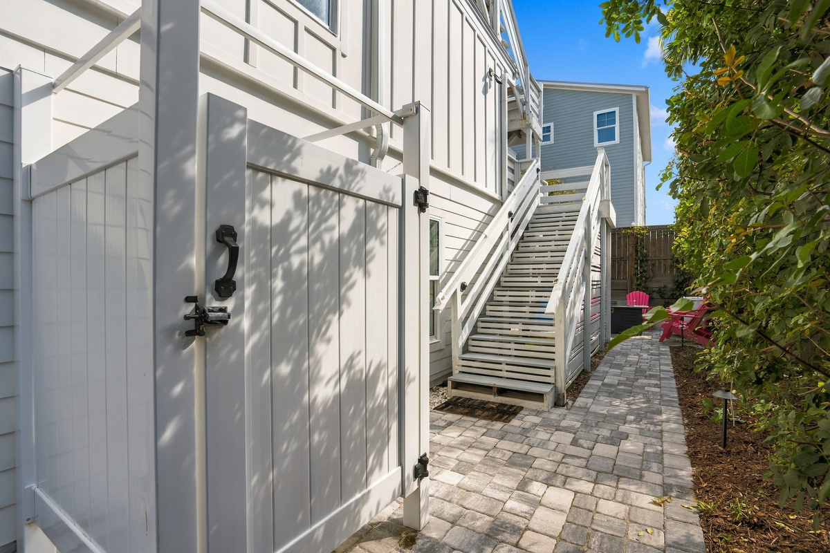 Outdoor shower area, featuring a convenient spot to rinse off after a day at the beach.