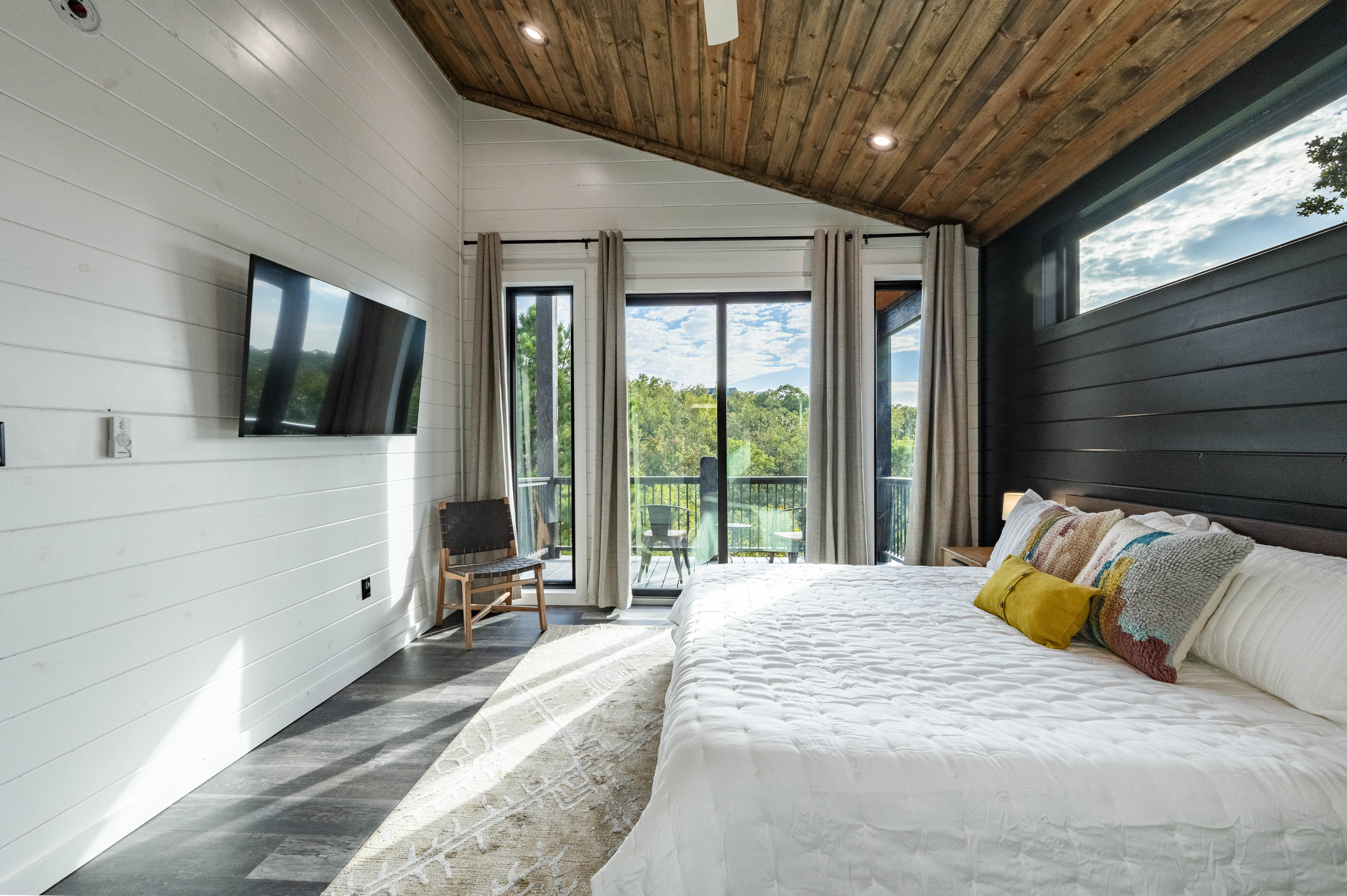 Wake up to breathtaking panoramic views from the patio off the bedroom upstairs!