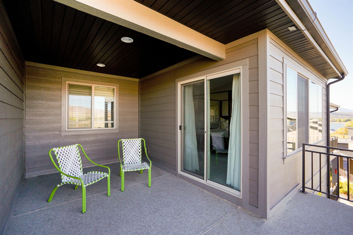 Private balcony off the primary bedroom—ideal for morning coffee.