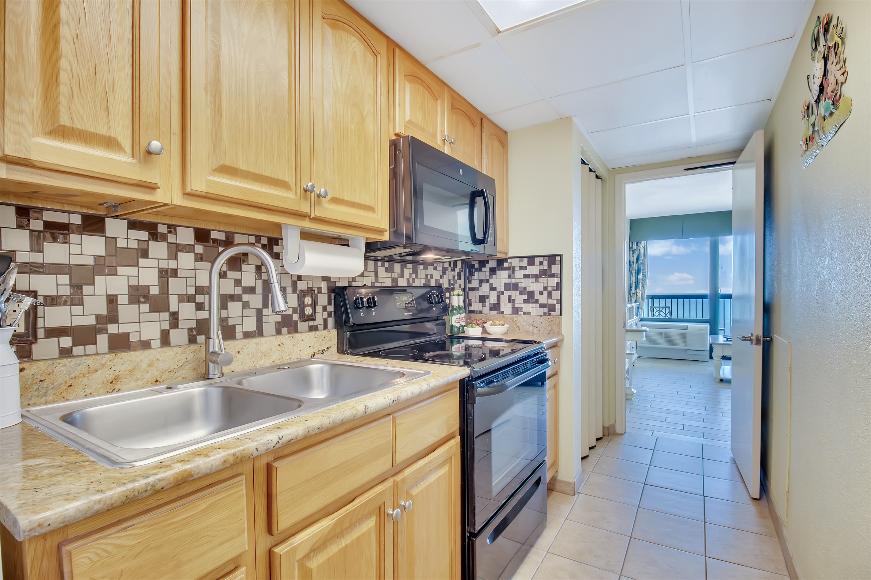 Bright and functional kitchen perfect for cooking after a day at the beach