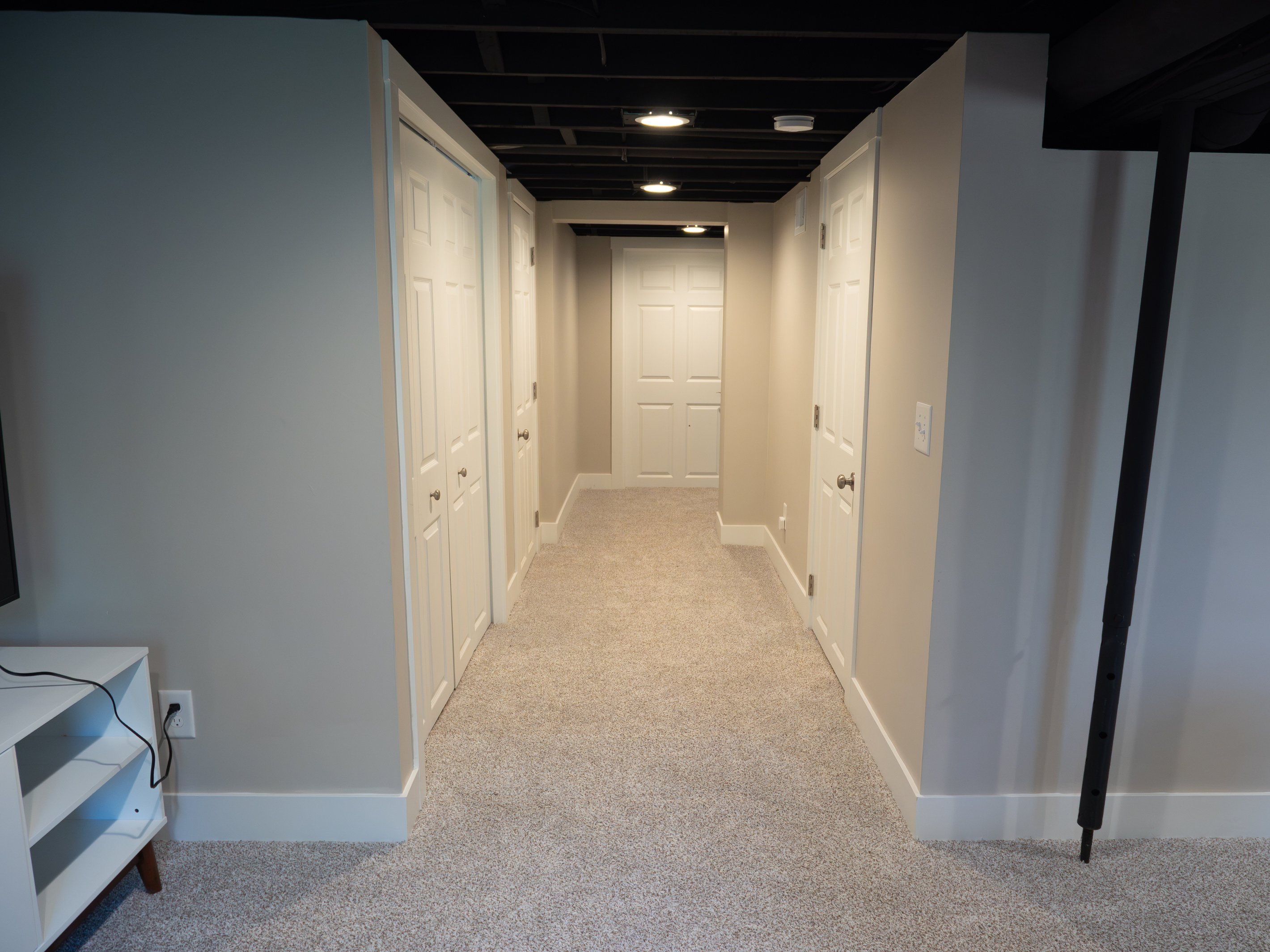 Lower-level hallway. Laundry in door on the left.
