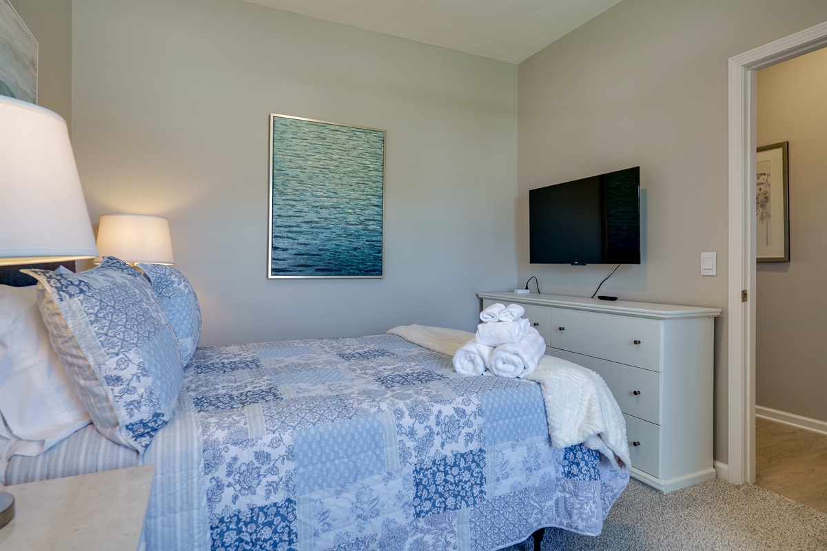 Modern Bedroom with Full Bed and TV