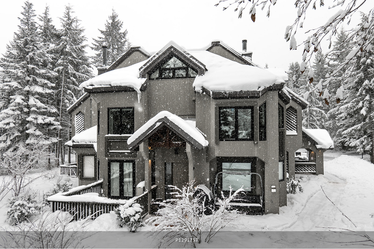 End-unit townhome exterior in winter snow