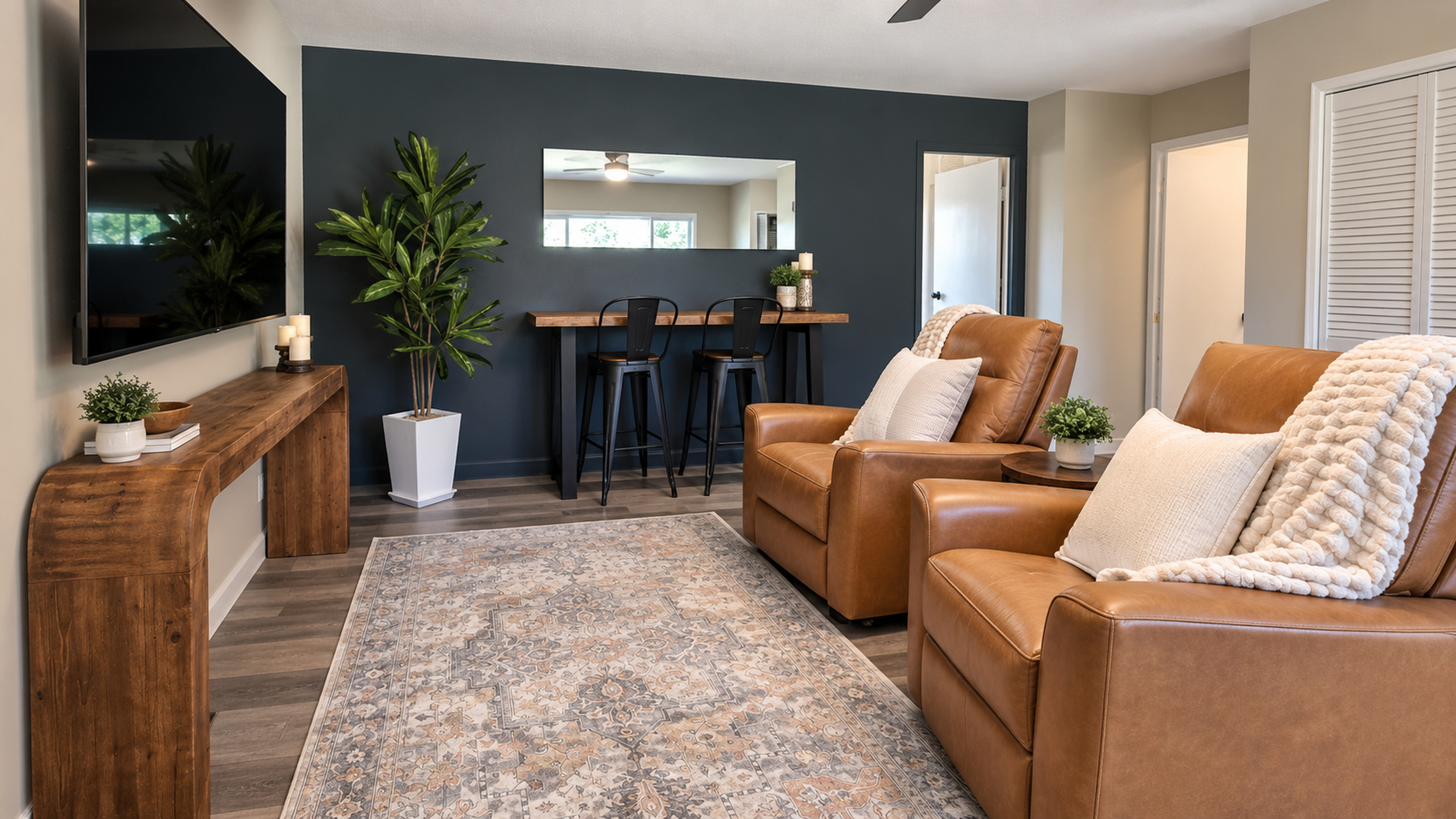 A second living space designed for relaxing! Settle into our swivel recliners, enjoy the 75" Roku TV, or pull up a seat at the pub table for games, snacks, or conversation.