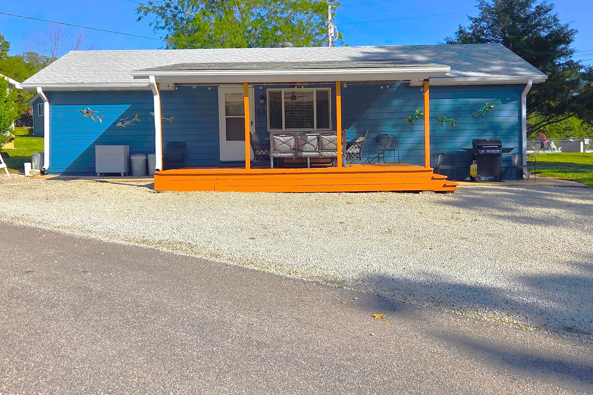 Such a fun place to stay! Newly stained spacious front porch is a perfect hangout for all with lake views!