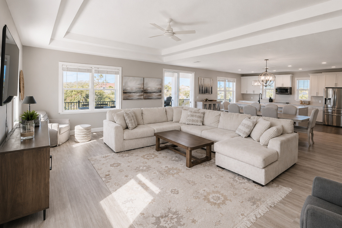The heart of the home: sink into the oversized sectional as the cook calls out from the kitchen and someone sets the table nearby. Open, sunlit, and made for movie nights and lazy afternoons, this is where the family naturally comes together.