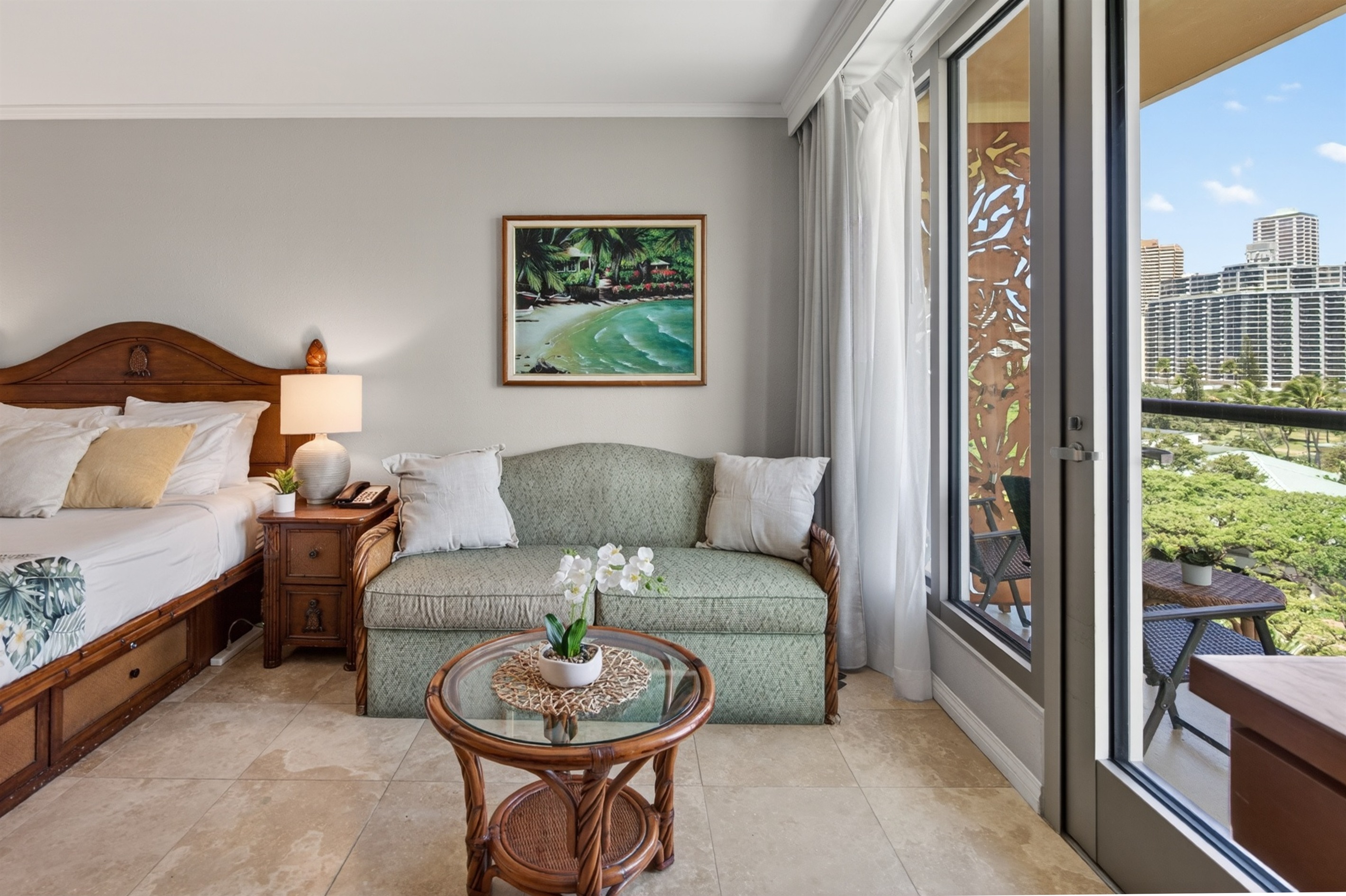 Queen sofa sleeper and direct access to private lanai with outdoor seating