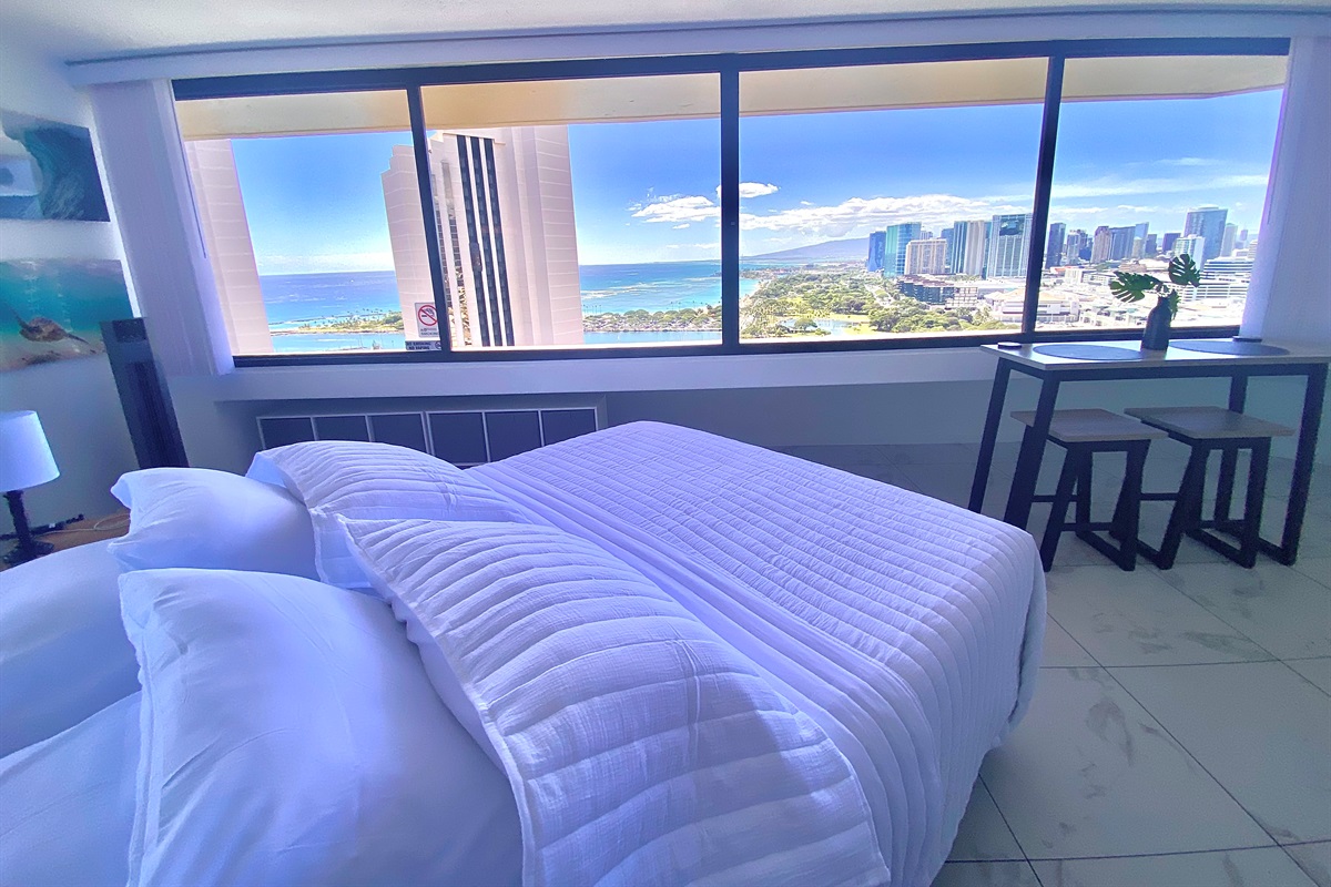 Wake up to panoramic views of the Pacific Ocean and Honolulu skyline right from your bed. This bright and airy Waikīkī suite combines comfort, elegance, and breathtaking scenery — the perfect setting for your island escape.
