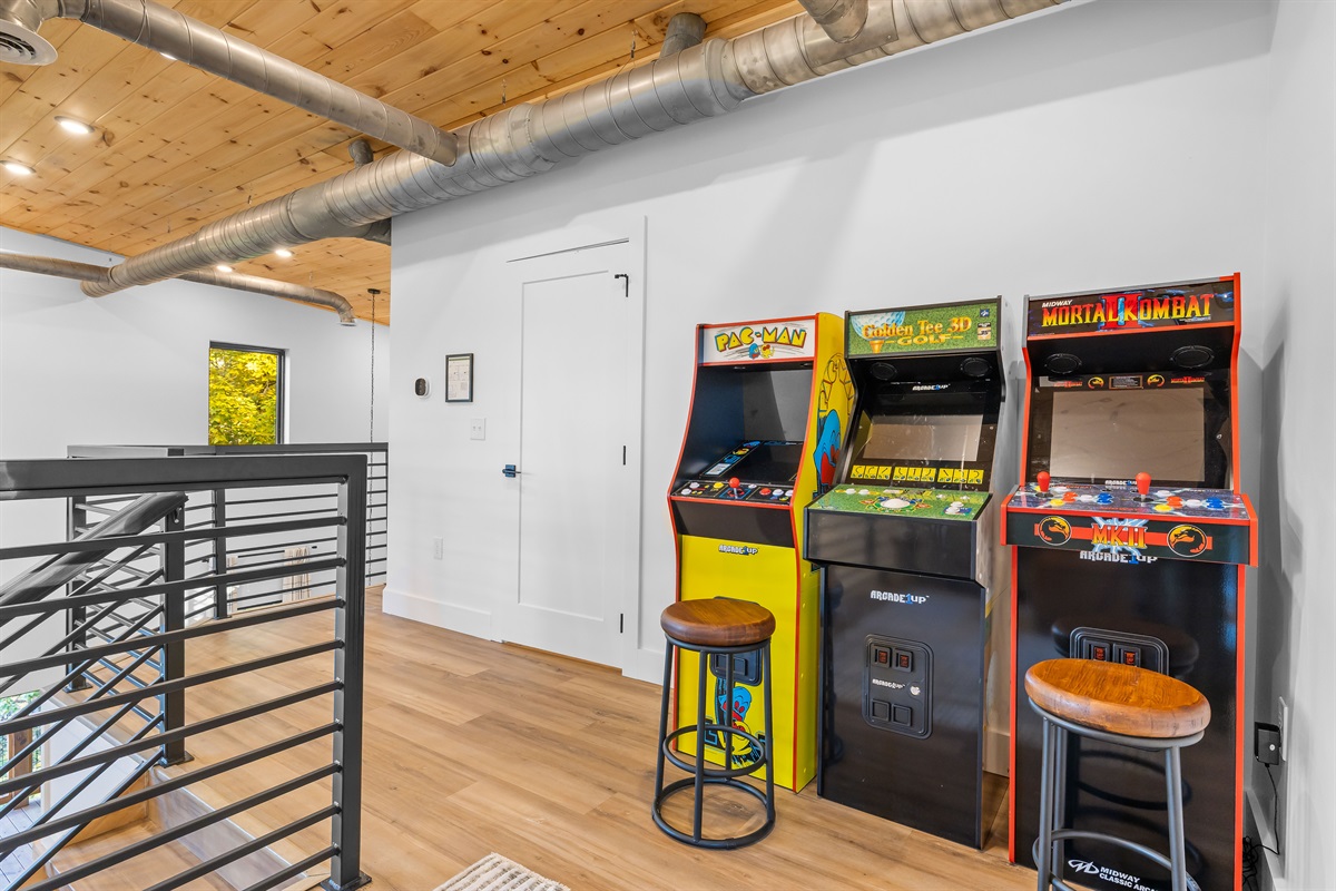 Arcade games in the loft for fun family moments