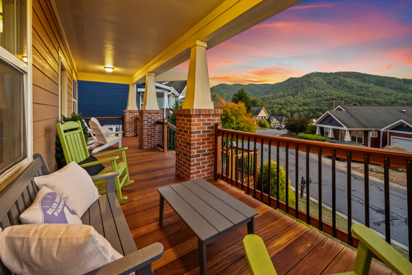 Enjoy nature's beauty from the large front porch