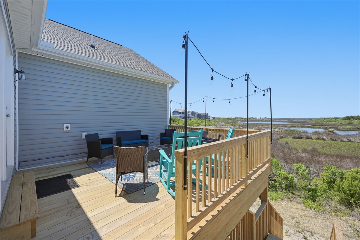 Private deck overlooking peaceful marsh views&mdash;great for sunset relaxation