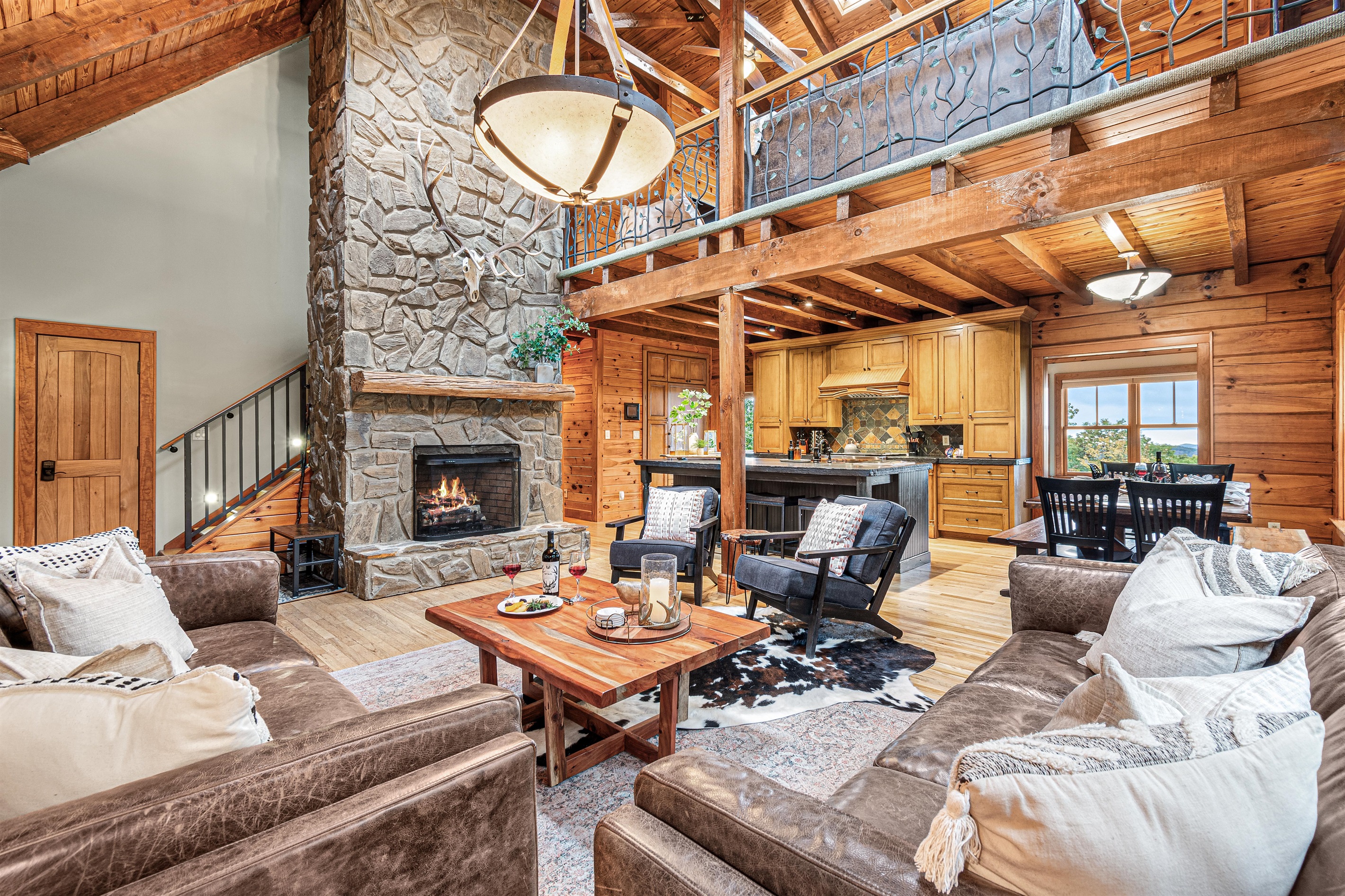 Relax in the main living area with a fire and glass of wine with the family.