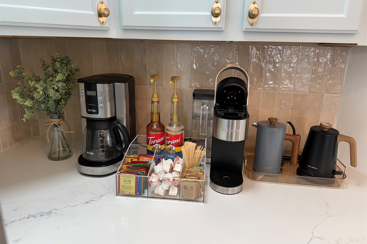 Your choice - Coffee or Tea! Drip coffee pot, Keurig, teas, tea kettle, plus Torani syrup, sugars and creamer.