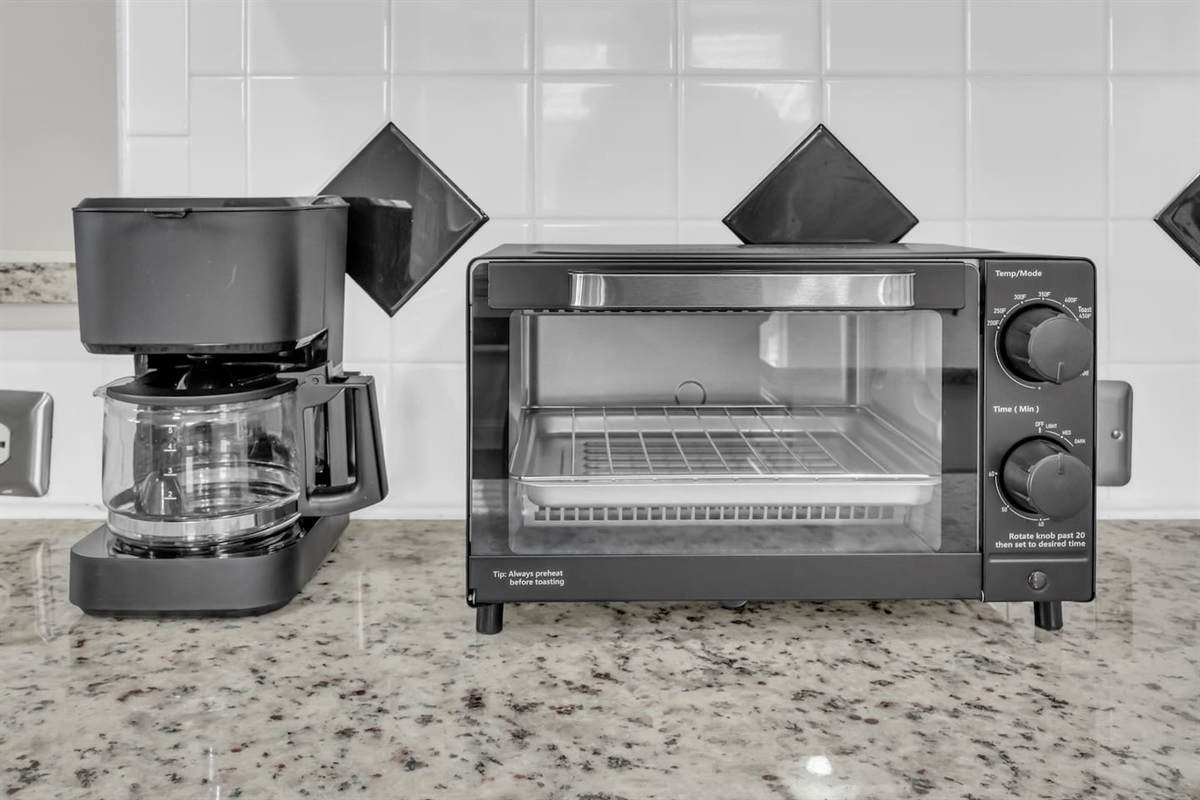 Simple drip coffee maker with coffee provided, making mornings easy before exploring Frisco or settling in for the day. Enjoy a crispy bagel with this classic toaster oven. 