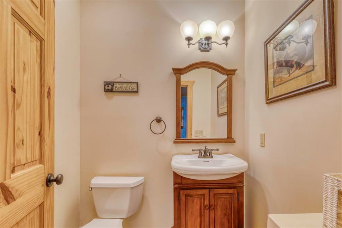 Convenient half bathroom available for quick use.