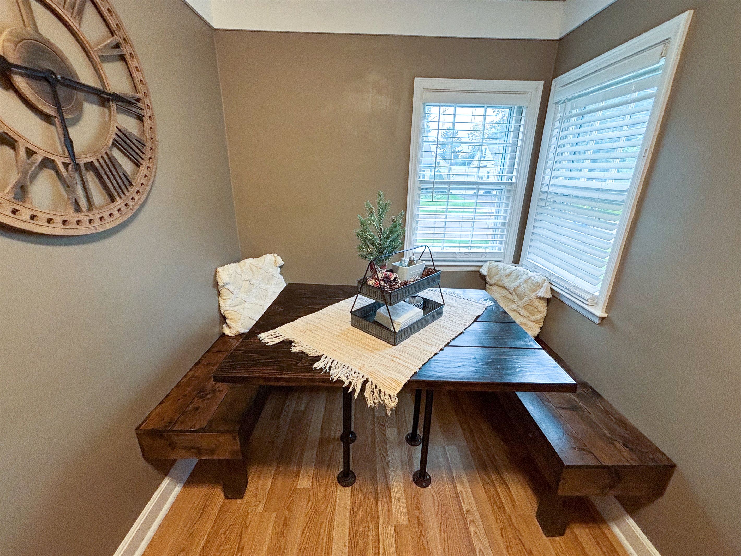 Modern and efficient—everything you need to create a delicious meal. The kitchen features a stainless steel refrigerator, stove, coffee maker, kitchenette oven, kettle, and blender
