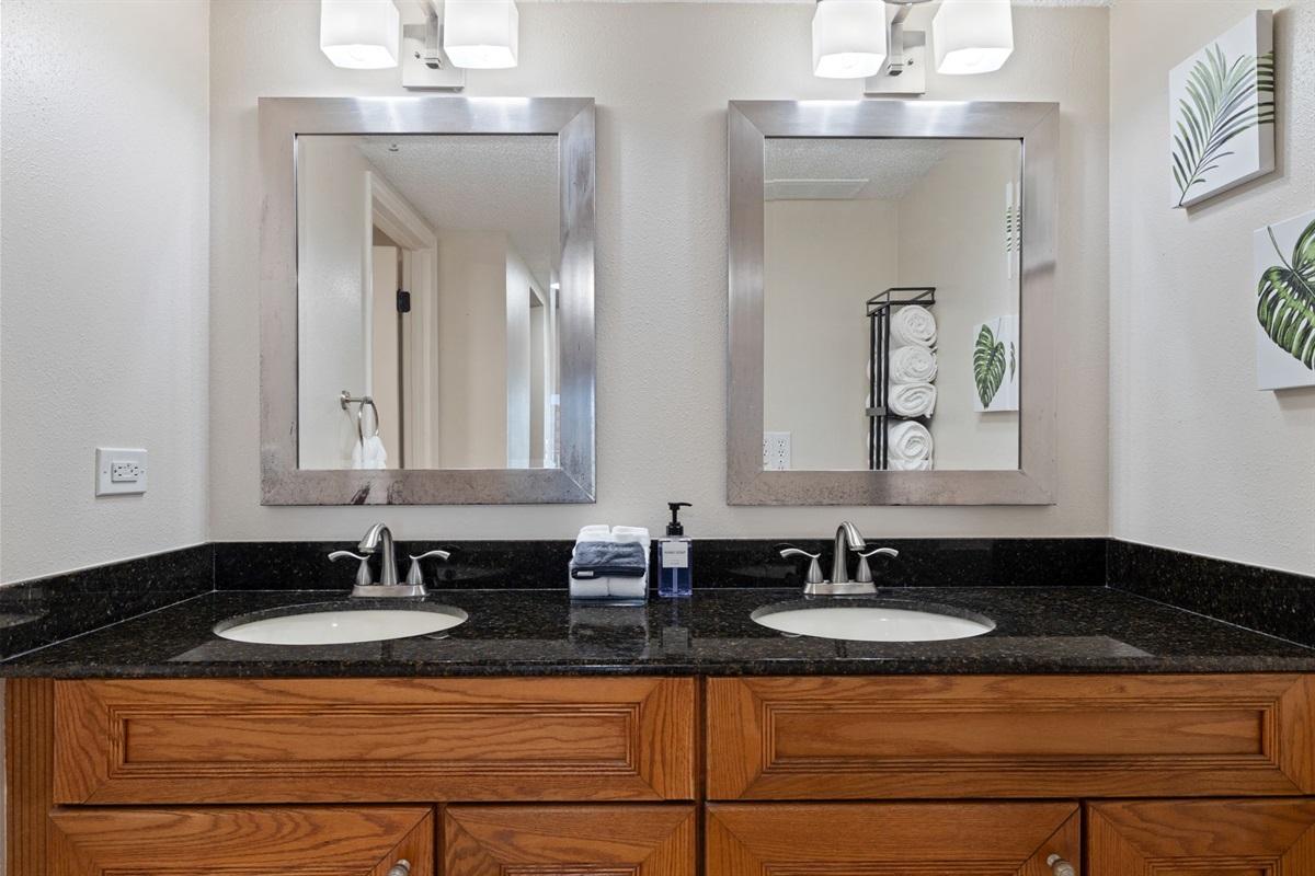 King bedroom ensuite bathroom with double vanity.
