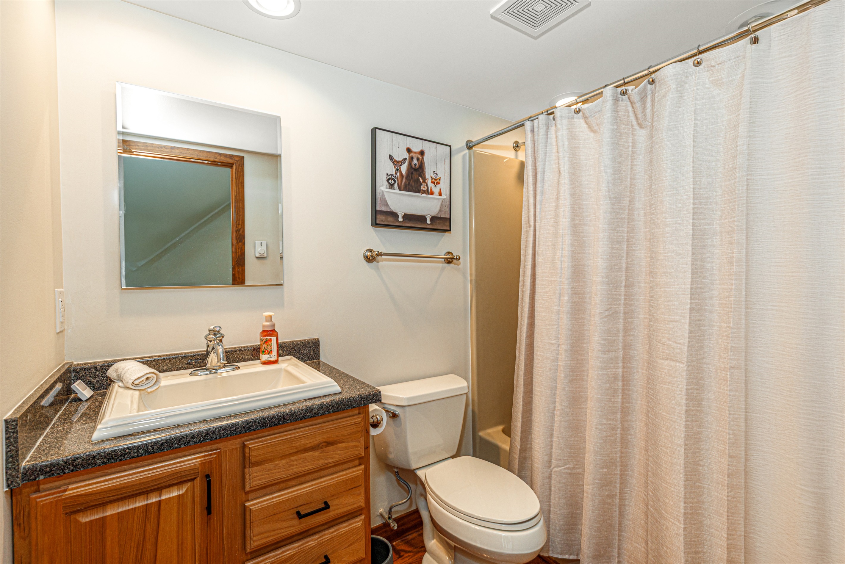 Main-level bathroom (ensuite to bedroom and accessible from main floor living area)