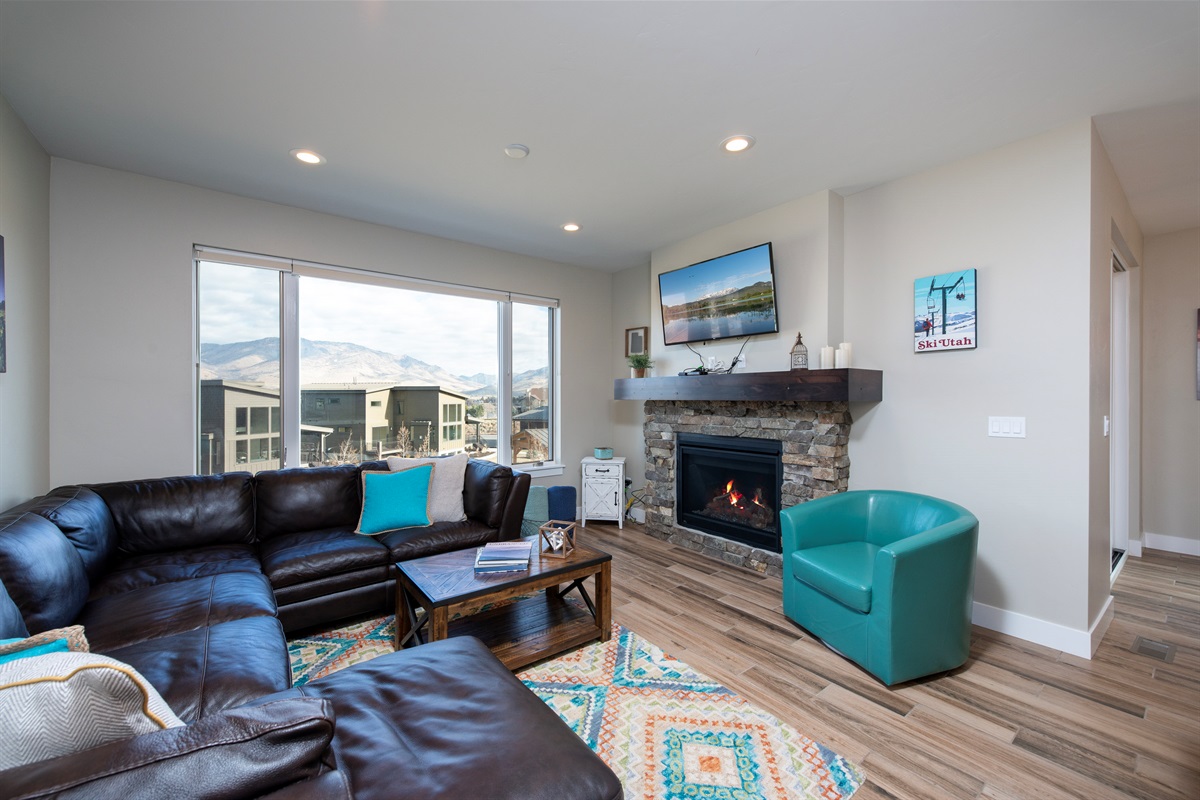 Unwind fireside in the inviting living room after a day of adventure