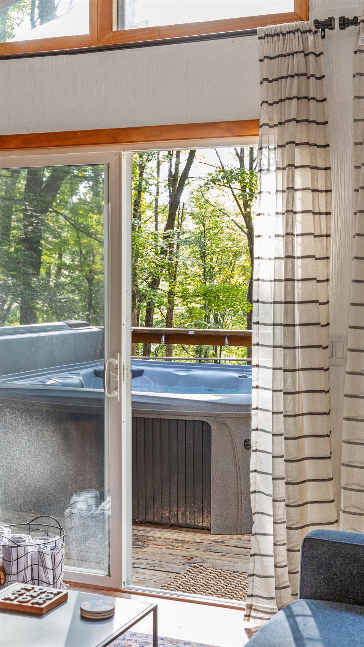 View of hot tub outside of living room