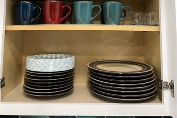 Specialty glassware, coffee mugs and a variety of plates. Don't like to do dishes? Use some of the paper plates for easy use.