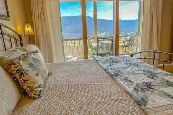 Wake up to Mt. Le Conte from this main floor king suite, Tanasi Lodge