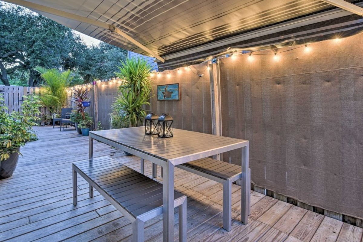 Fenced Side Yard with Awning and Dining Table
