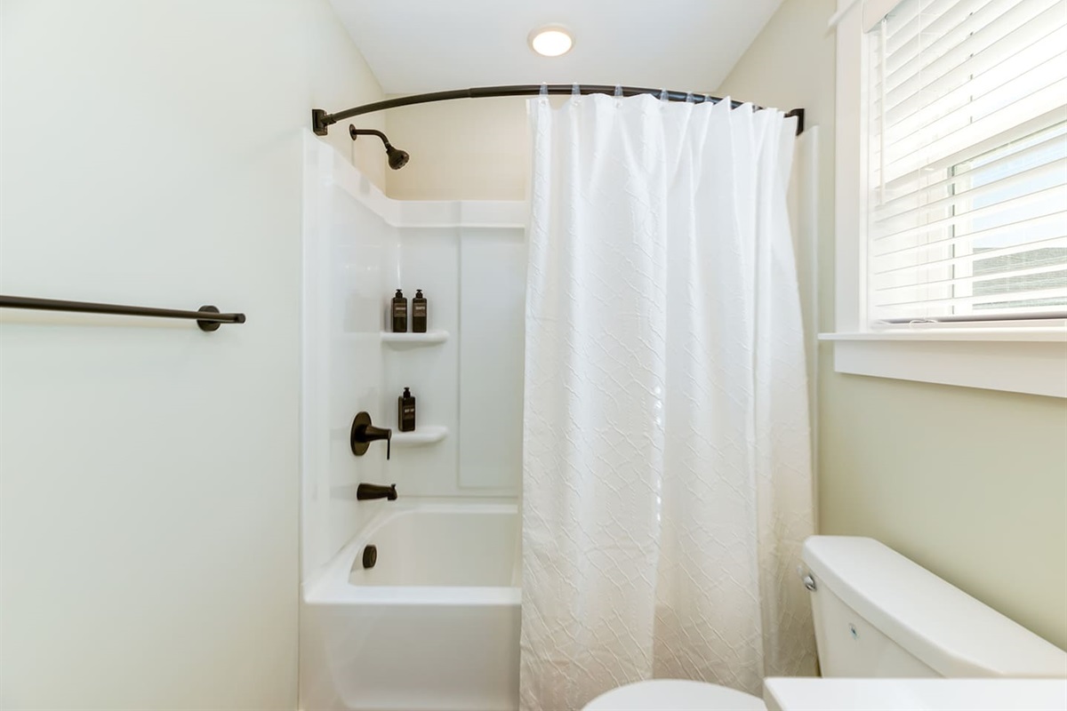 Bright full bathroom with everything needed during your stay.