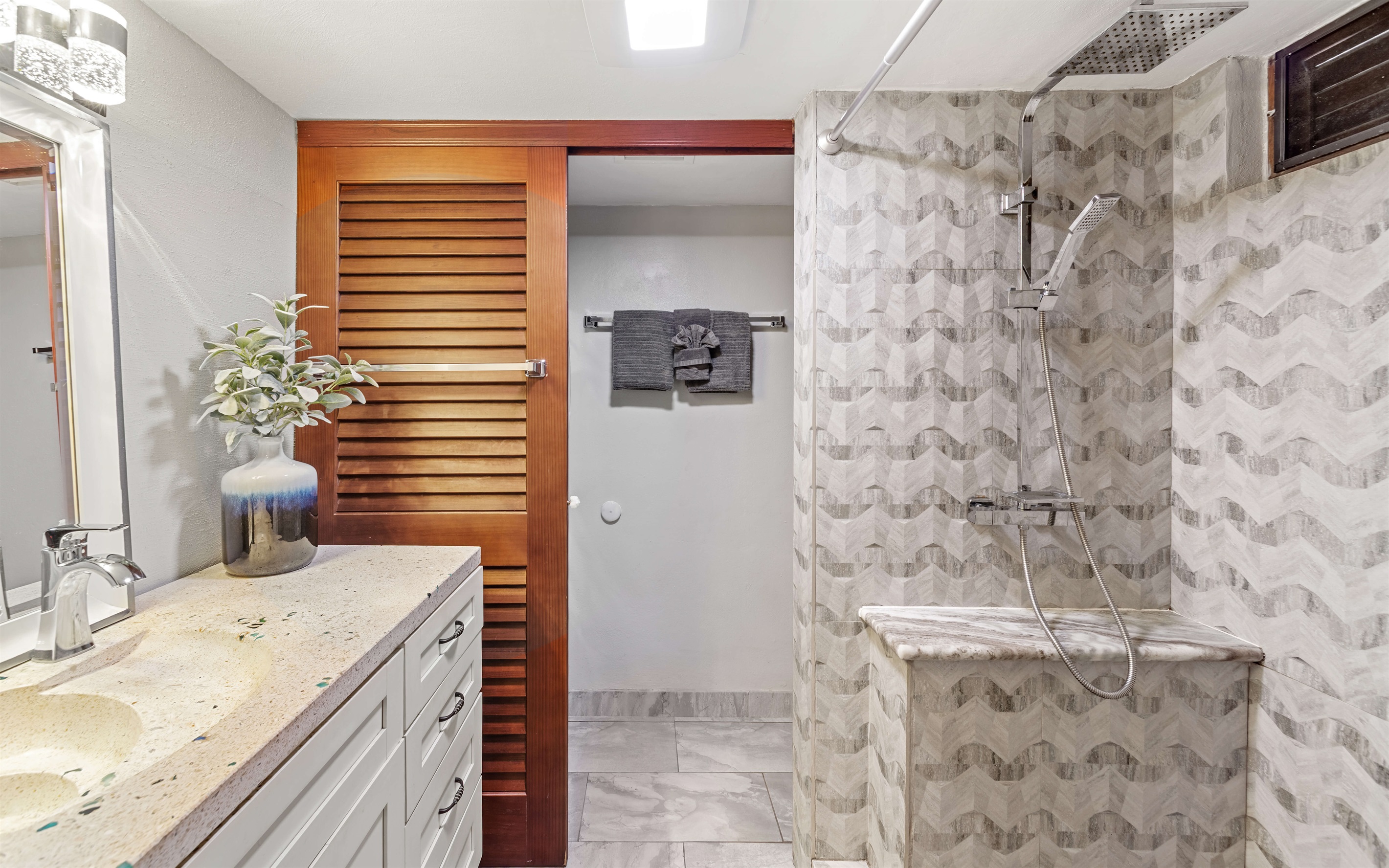 Full bathroom with step in shower and laundry. 