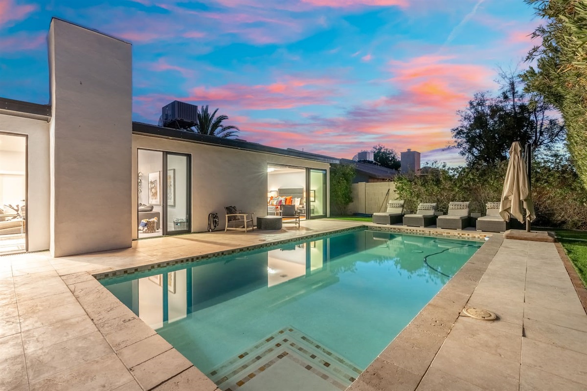 Sunset reflections in your backyard oasis.