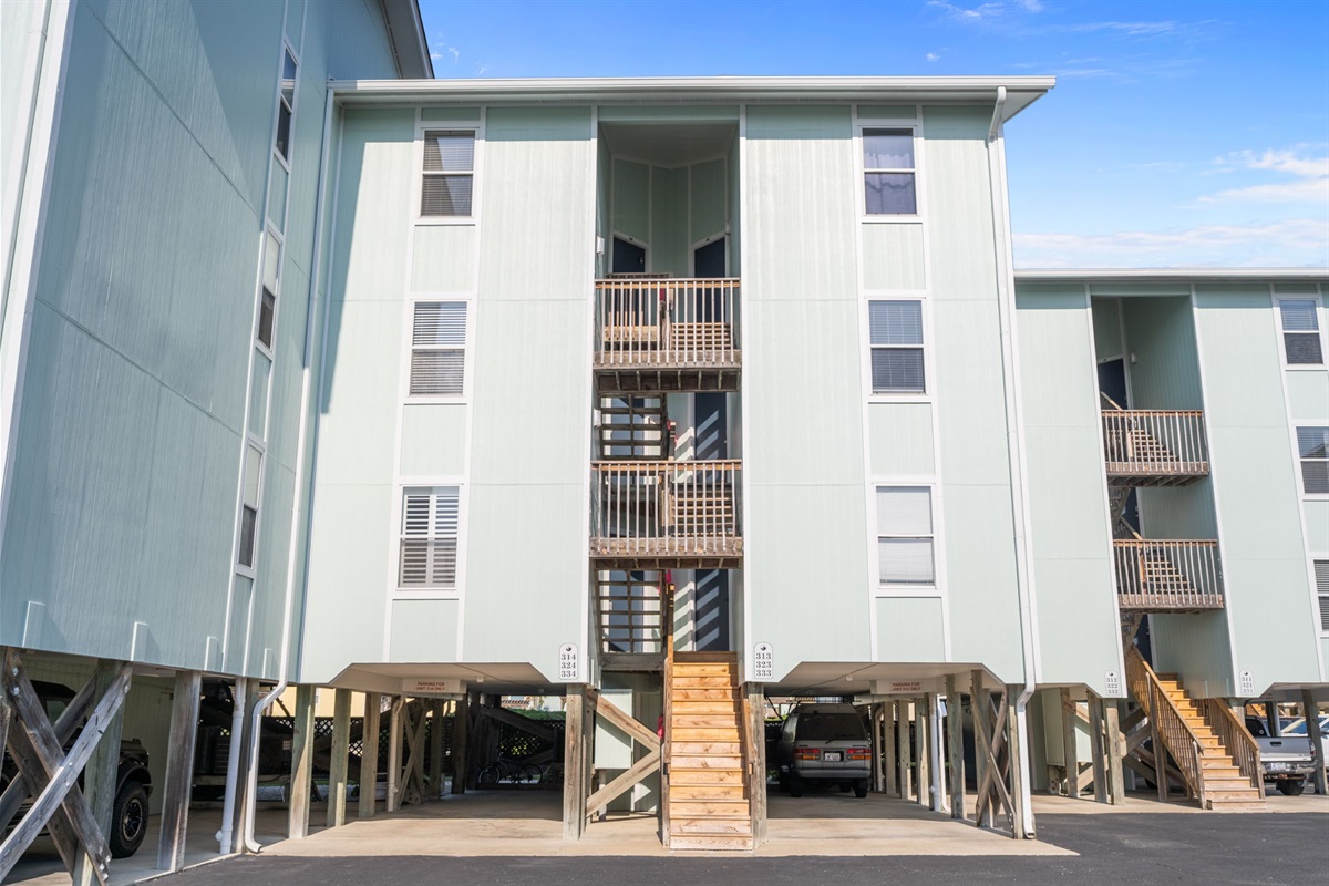 Elevated beach-style buildings with convenient covered parking