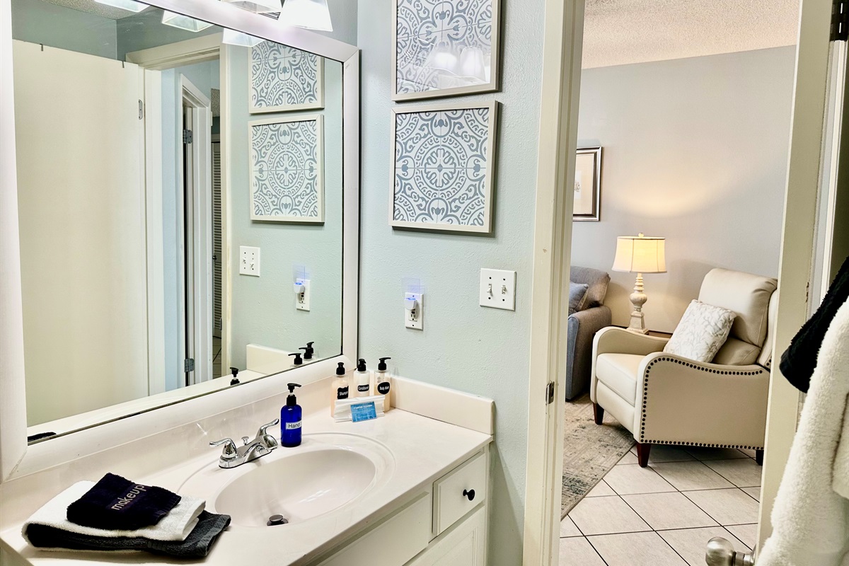 The bathroom connects from the master and from the living area...