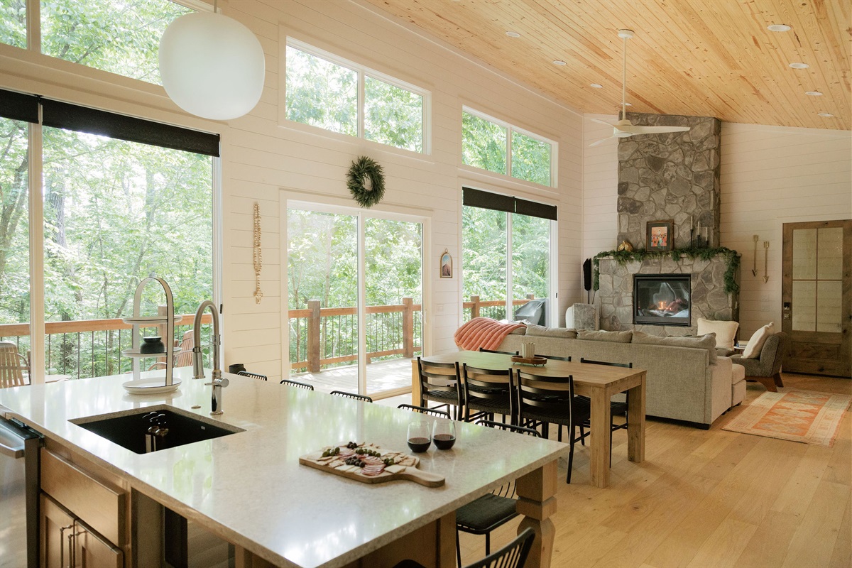 Cozy living space with view of the woods