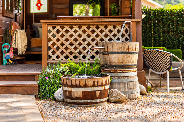 Our custom-designed, handcrafted wine barrel fountain adds a soothing soundtrack to your stay, with gently flowing water heard from both the backyard and kitchen.