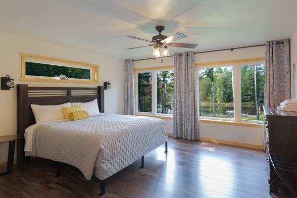 Main floor master with king bed & panoramic lake views